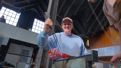 Make Your Own glassblowing class at Canberra Glassworks Participant glass blowing in MYO class