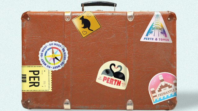 Brown suitcases with stickers