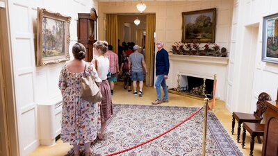 Guests walking down a corridor