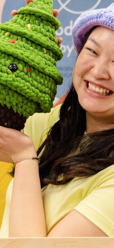 Productive by You Productive by You holding a crochet Christmas tree