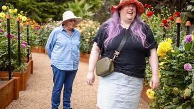 Two happy women exploring the gardens at Lanyon Homestead