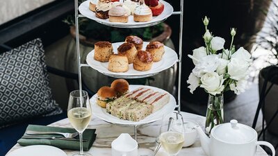 Close-up of high tea cake stand on table