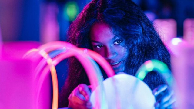 Child enjoying the Illuminate exhibition