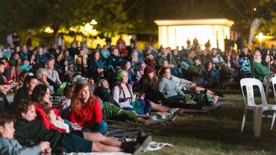 Crowd sitting in front of screen for Lights! Canberra! Action!