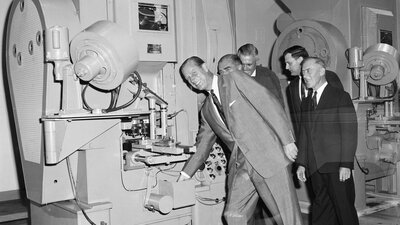Prince Philip opening the Mint in 1965 Photo shows Prince Philip minting the first coin at the Royal Australian Mint in 1965