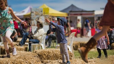 Child throwing straw