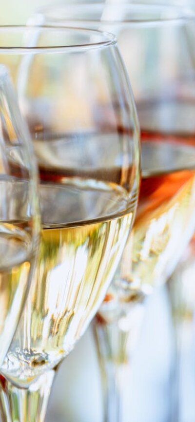 Whites, Rose and Reds available for tasting Wine glasses all in a row