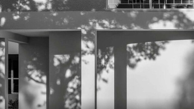 Bachelor Flats Northbourne Ave A black and white photograph of an architectural detail of a brutalist apartment building