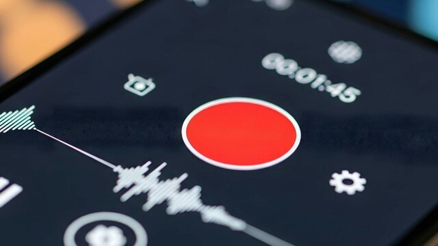 Oral History Pod: Capture your memories Close-up of a smartphone screen displaying a media player interface with a prominent record button.
