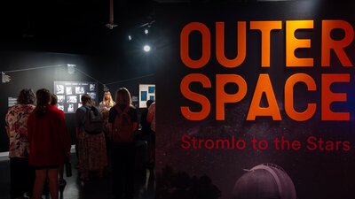 Outer Space: Stromlo to the Stars A group of people learning about the history of Mount Stromlo Observ