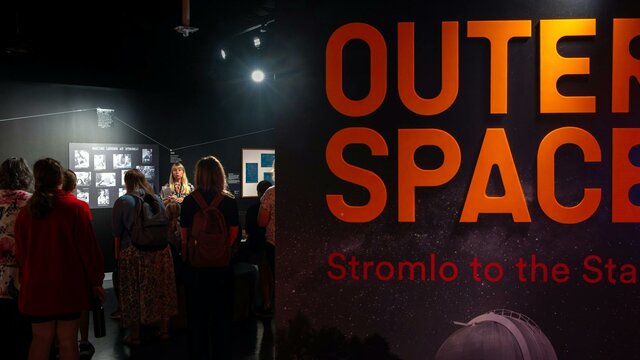 Outer Space: Stromlo to the Stars A group of people learning about the history of Mount Stromlo Observ