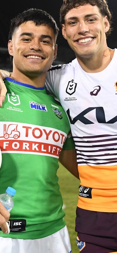 Matt Timoko and Jordan Riki after the Broncos' last game in Canberra in 2023.