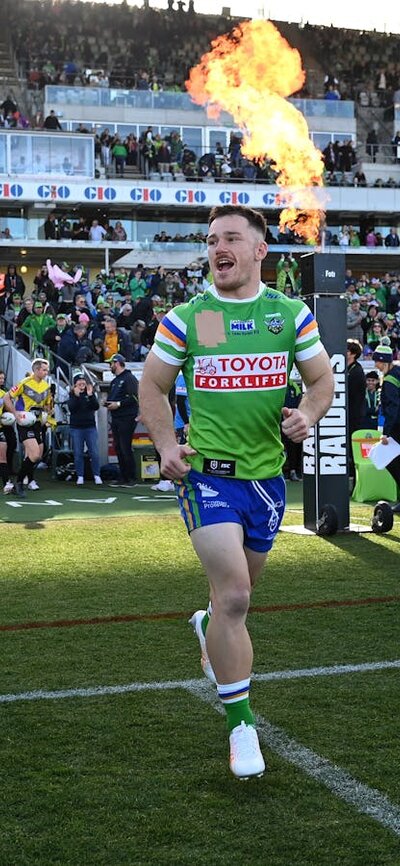 Tom Starling runs out against the Knights at GIO Stadium Canberra