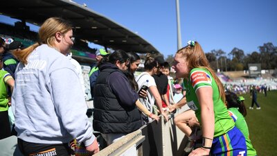 Grace Kemp  chats to fans after the Raiders NRLW game against the Knights