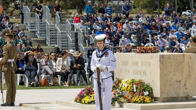 Join us as we pause to reflect servicepersons standing at each corner of the stone of remembrance