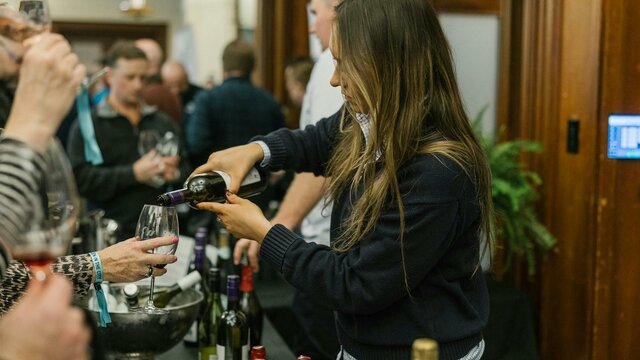 lady pouring wine