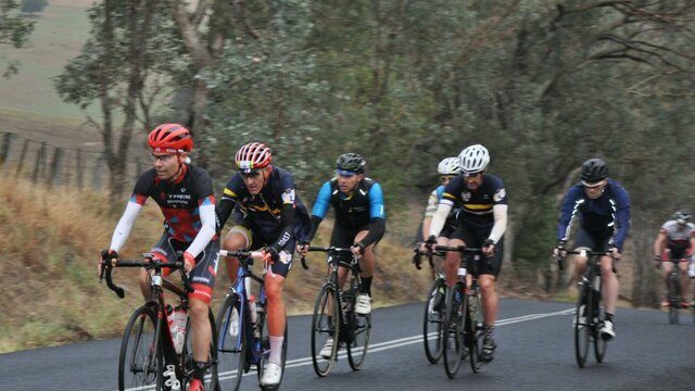 Snowy Valleys Cycle Challenge riders Group of riders ascending through scenic countryside