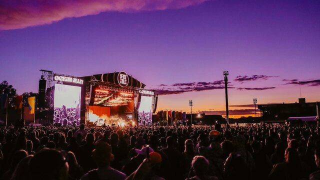 Spilt Milk Canberra A crowd of people enjoying music at dusk at Spilt Milk Festival