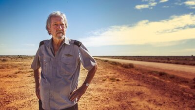 A man stands in the desert