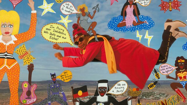 Flying over Indulkana, 2022 Kaylene Whiskey (cropped). © Kaylene Whiskey. AIATSIS Collection. A vibrant acrylic artwork depicting artist Kaylene Whiskey soaring surrounded by colourful elements.