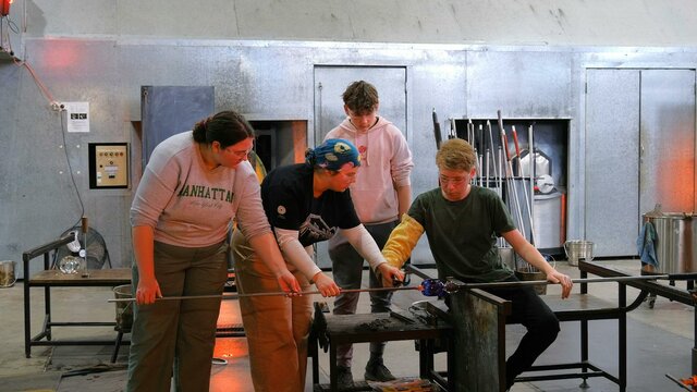 Teen glassblowing class Participants and teacher during glassblowing class