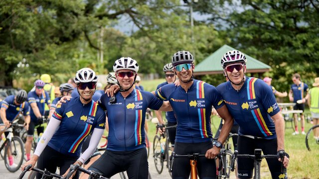 Cyclists including Channel 7's Mark Beretta at the end of Signature Tour '25 Four cyclists casually on bikes not riding inc. Ch7's Mark Beretta at the end of Signature Tour '25
