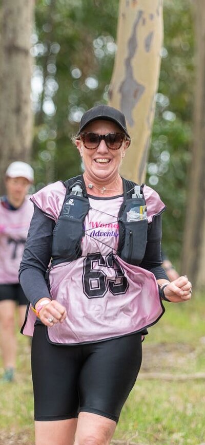 a team is running at the Women Only Adventure Race