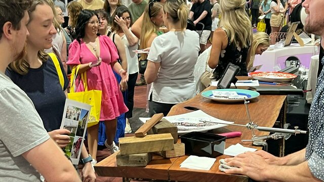 Your Local Wedding Guide Canberra Expo Couples talking with exhibitors at Your Local Wedding Guide Canberra Expo.