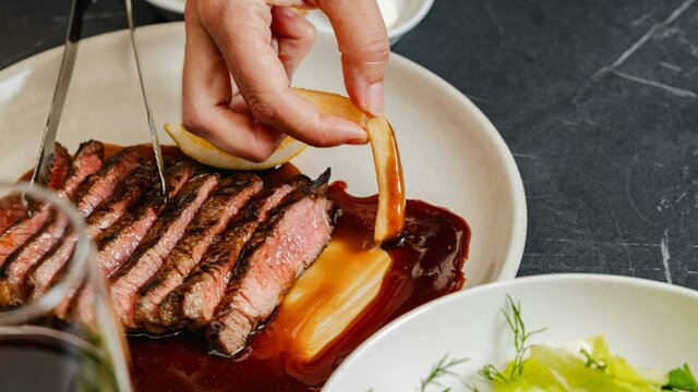 Atrium Restaurant & Bar Sliced steak with chip dipped in gravy