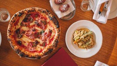 Diavola pizza, zucchini pasta and  supplì al telefono