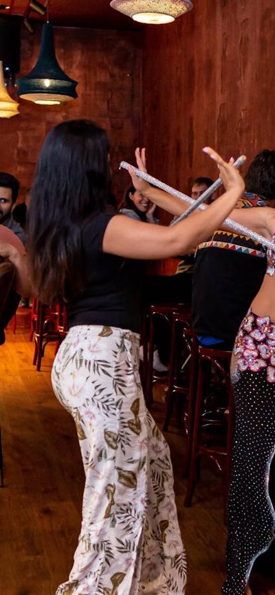 Belly dancer with customer at Bar Beirut