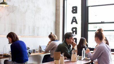 People relaxing in the coffee bar