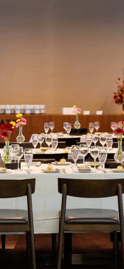 A dining table set up in the Bookplate cafe.