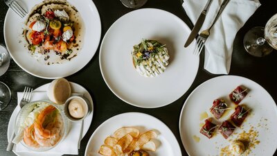 A variety of dishes placed on a table.