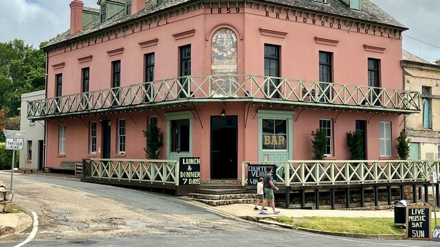 The Braidwood Hotel Exterior photo of the Braidwood Hotel taken from Wallace St. It is a Georgian Style Pub.