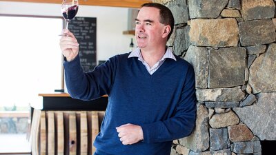 Winemaker Tim Kirk with a glass of red wine