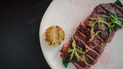 Ranger's Valley black onyx flank steak, Davidson plum teriyaki, charred lime