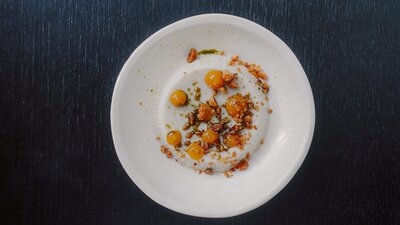 Coconut pannacotta, Geraldton wax, macadamia, yuzu sesame