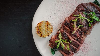 Ranger's Valley black onyx flank steak, Davidson plum teriyaki, charred lime
