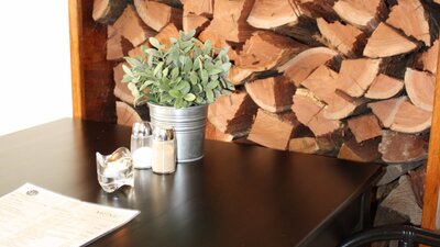 Wood pile near table