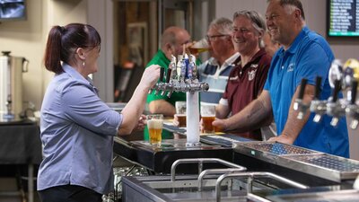 Nat serving drinks Crookwell Services Club