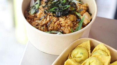 Fried rice and wontons in takeaway containers