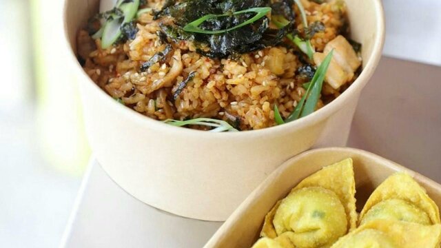 Fried rice and wontons in takeaway containers
