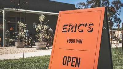 Close up of Eric's Food Van sign in front of the Malbon's entrance.