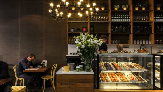 Farmers Daughter Cafe interior with cake displays