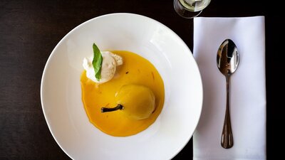 Saffron spiced poached pear dessert