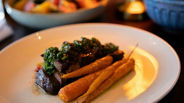 Lamb Rump Cap Lamb Rump Cap – Succulent lamb with glazed carrots, tomato salsa and chimichurri