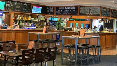 Bar area showing dining tables. No people in photo