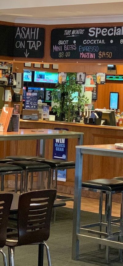 Interior bar area at the Hibernian Bar area showing dining tables. No people in photo