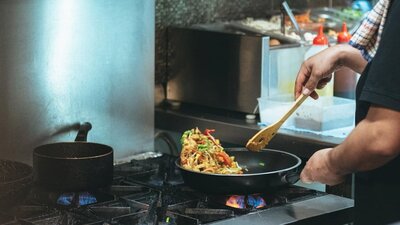 A meal being cooked on a stove